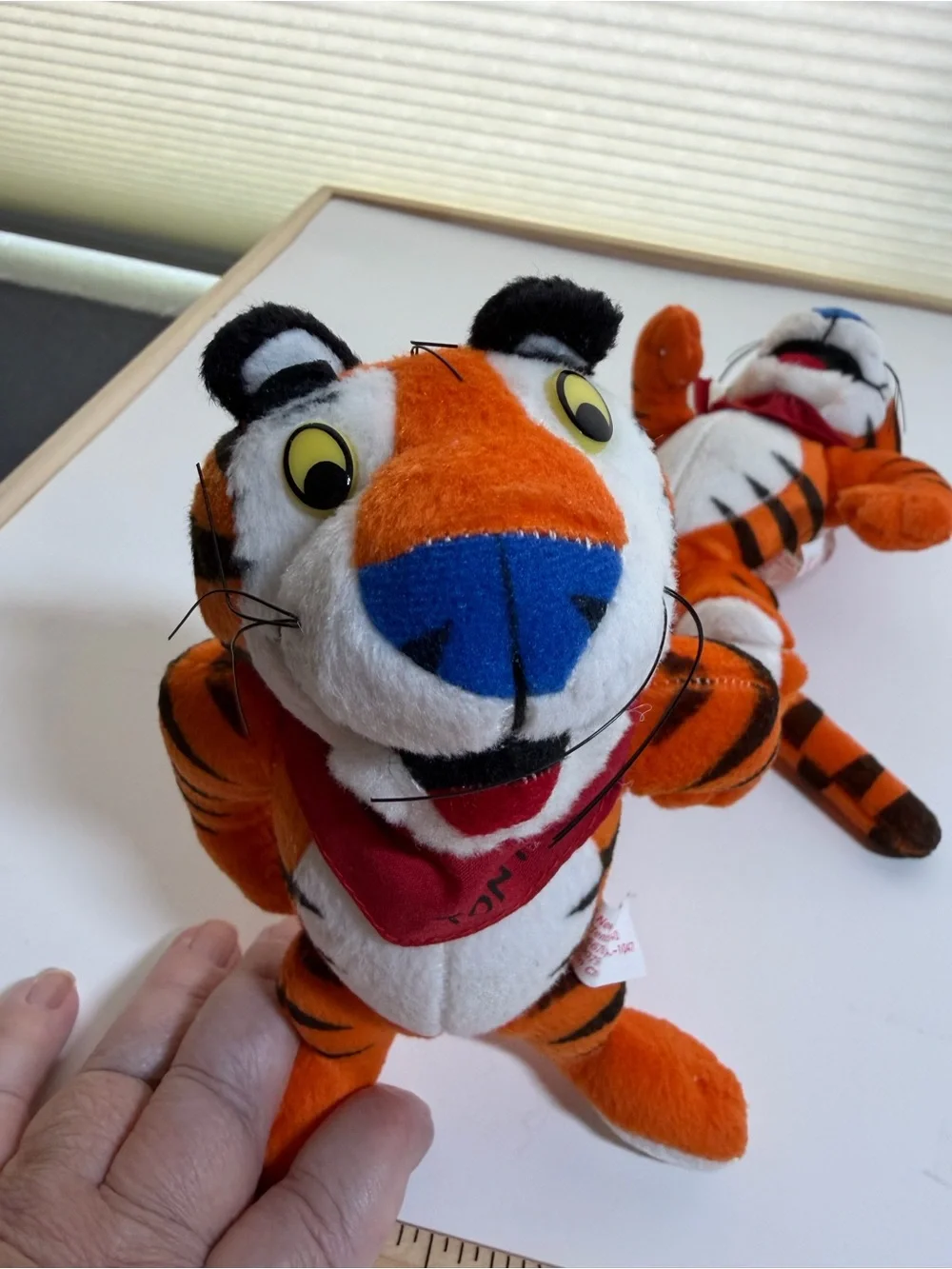 Two Kellogg Tony the Tiger plush